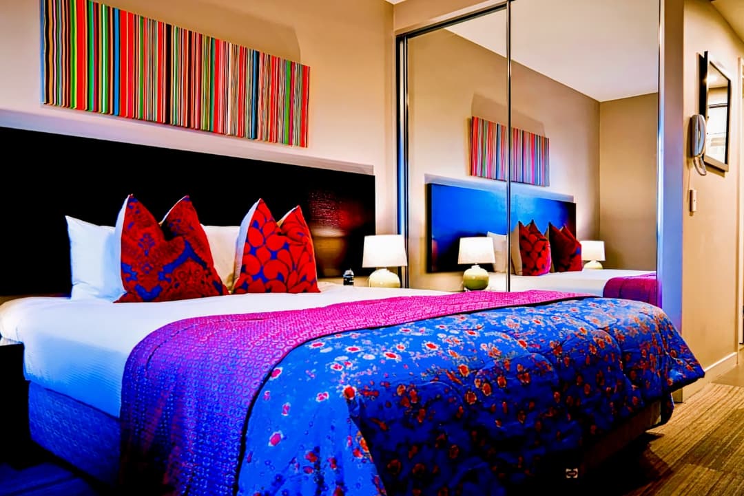 Quest Serviced Apartments Mascot